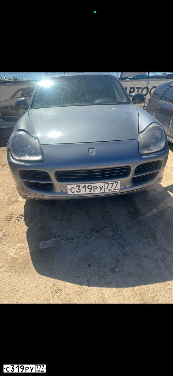 Фото автомобиля PORSCHE CAYENNE, 2004 — госномер С319РУ777. Цвет: СЕРЫЙ