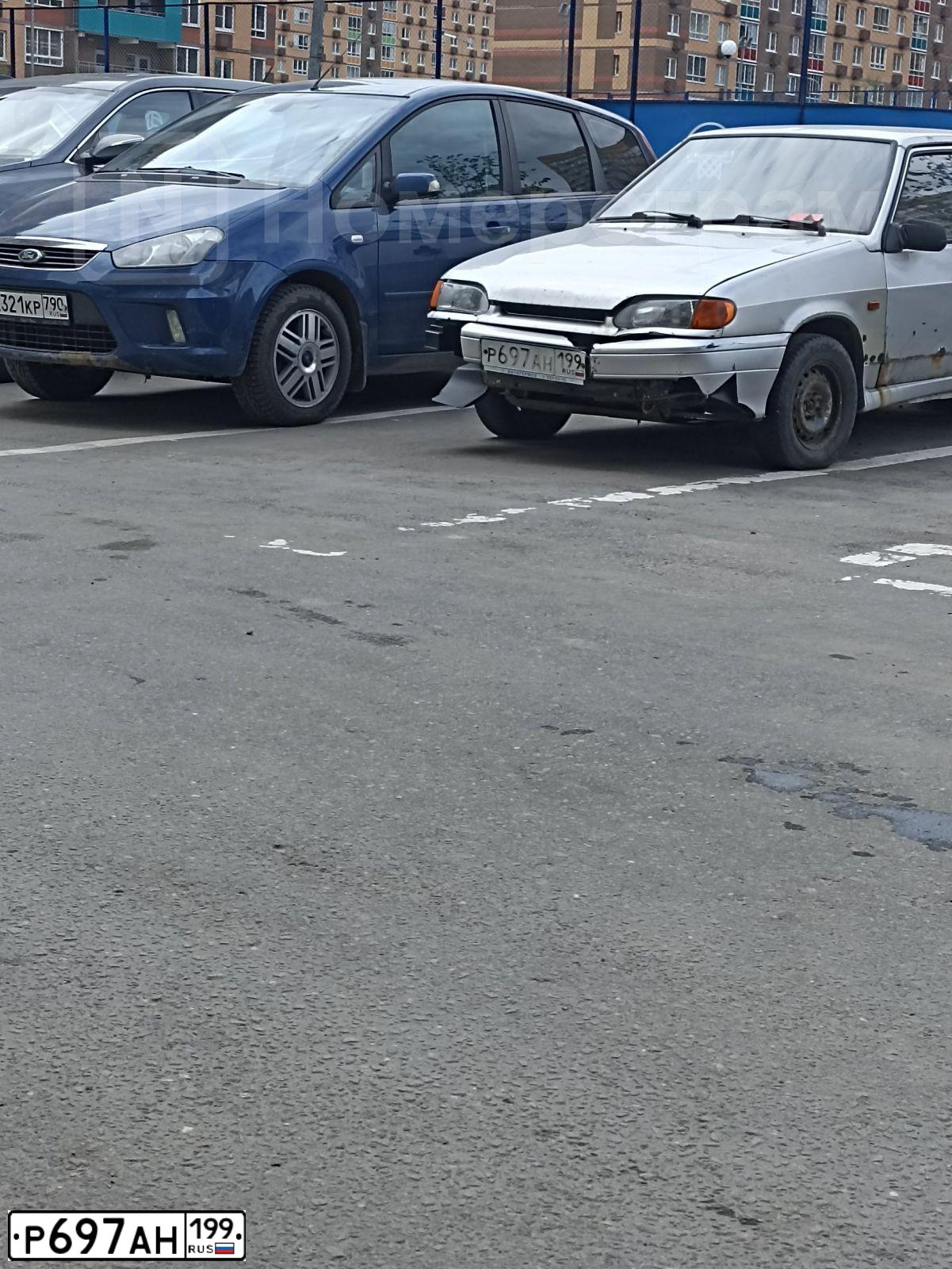 Фото автомобиля LADA 2115 SAMARA, 2008 — госномер Р697АН199. Цвет: СЕРЫЙ МЕТАЛЛИК