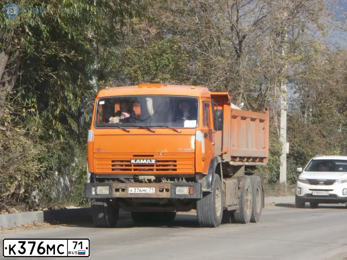 Фото автомобиля KAMAZ 65115 /6X4/, 2009 — госномер К376МС71. Цвет: ОРАНЖЕВЫЙ