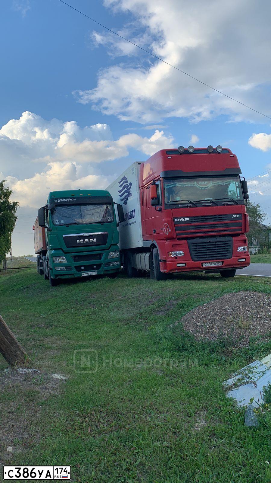 Фото автомобиля DAF XF 95 FT /4X2/, 2004 — госномер С386УА174. Цвет: Красный