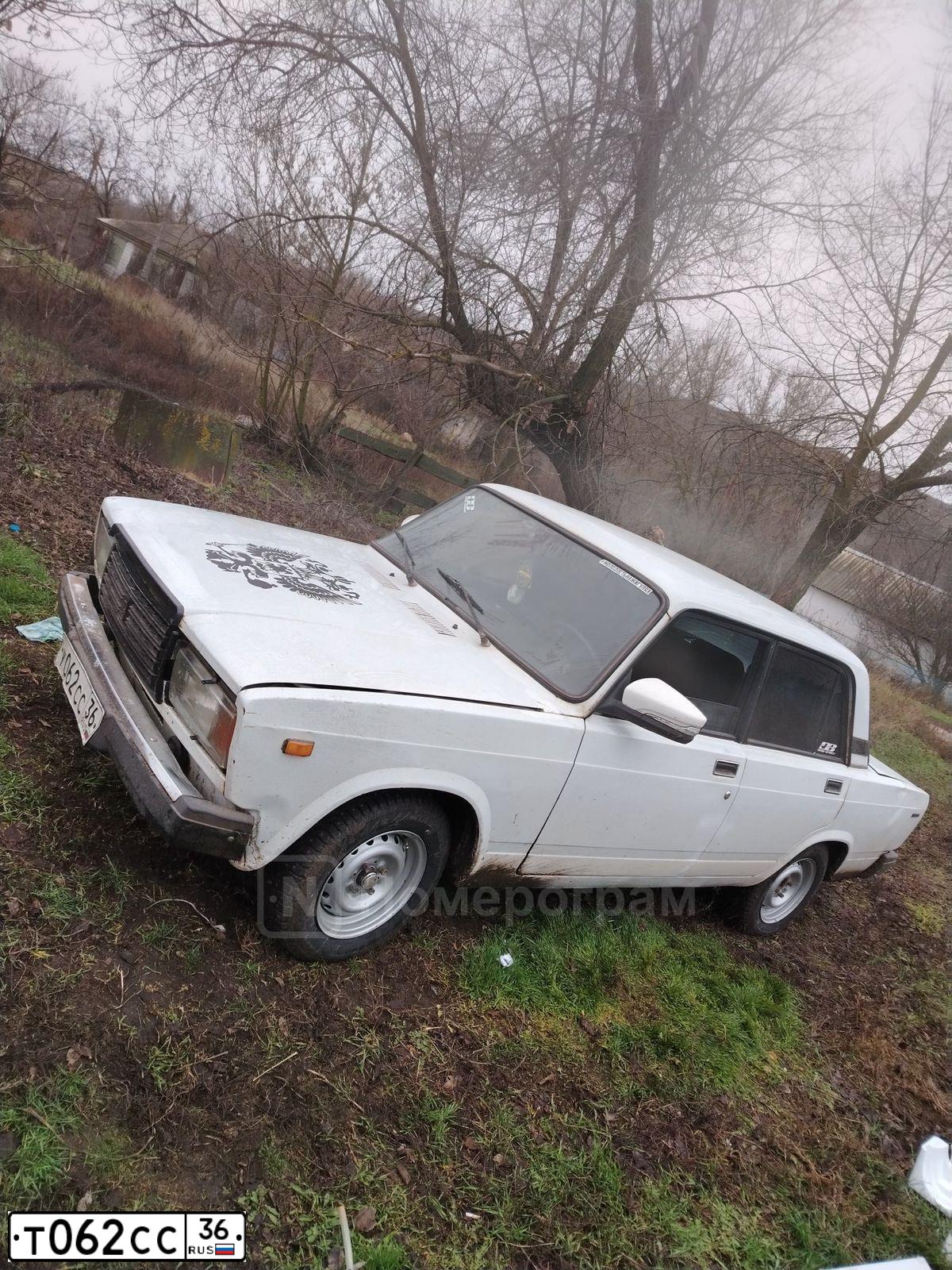 Фото автомобиля LADA 2110, 1999 — госномер К013РА36. Цвет: СЕРЕБРИСТО-КОРИЧНЕВЫЙ