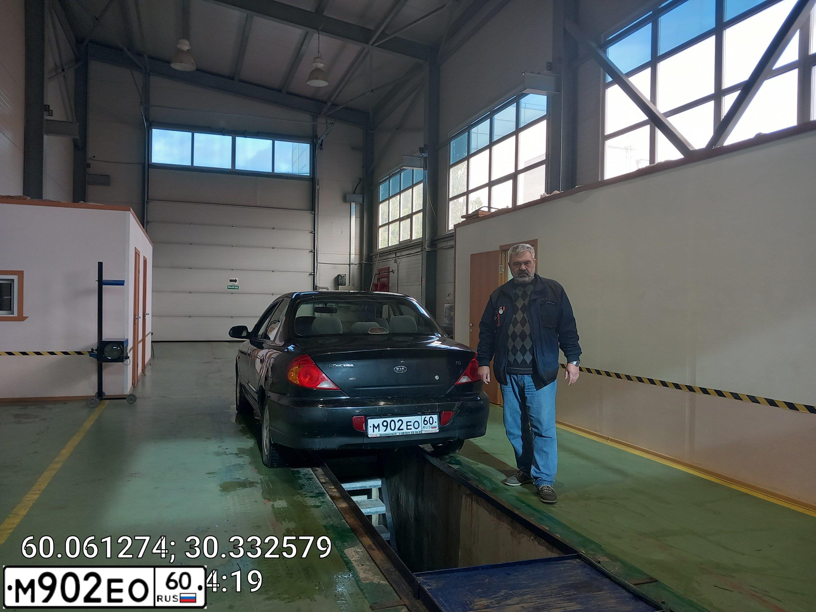 Фото автомобиля KIA SPECTRA, 2008 — госномер М199УР198. Цвет: ЧЕРНЫЙ