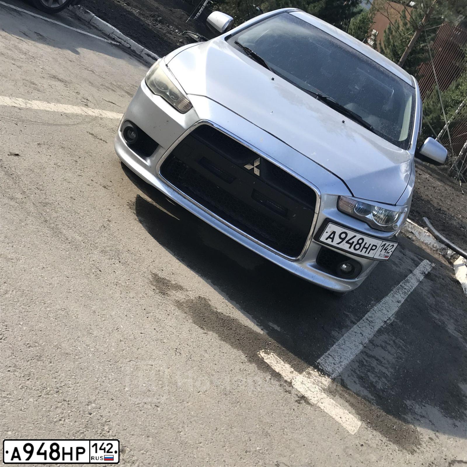 Фото автомобиля MITSUBISHI LANCER, 2008 — госномер А948НР142. Цвет: Серебристый