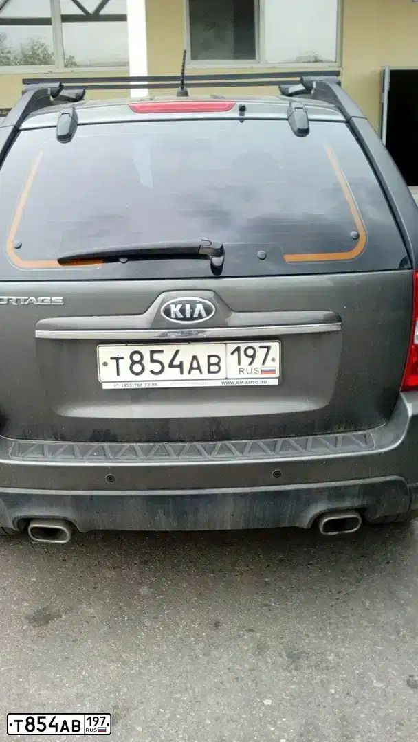 Фото автомобиля KIA SPORTAGE, 2010 — госномер Т854АВ197. Цвет: СЕРЫЙ СВЕТЛЫЙ
