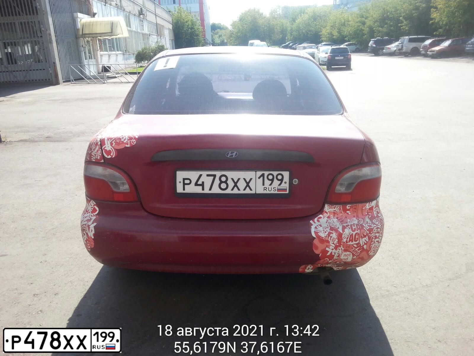 Фото автомобиля HYUNDAI ACCENT, 1997 — госномер Т202РМ50. Цвет: Красный