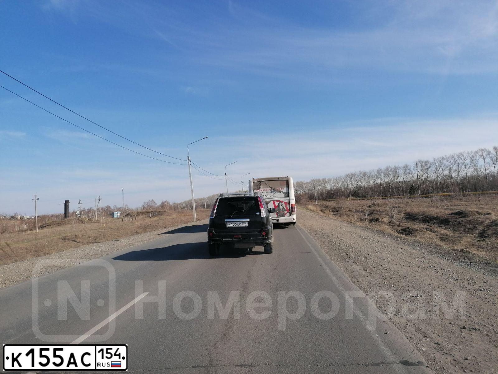 Фото автомобиля NISSAN X-TRAIL, 2006 — госномер К155АС154. Цвет: ЧЕРНЫЙ