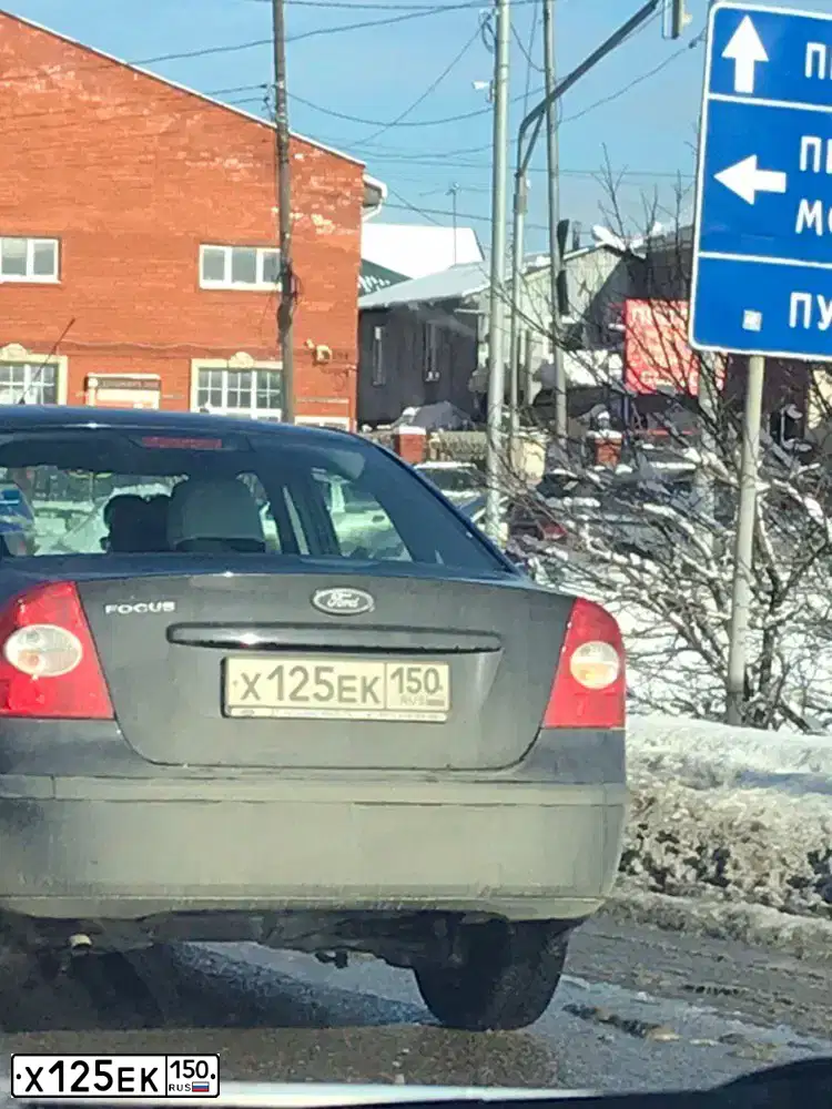 Фото автомобиля FORD FOCUS, 2007 — госномер Х125ЕК150. Цвет: СИНИЙ ТЕМНЫЙ