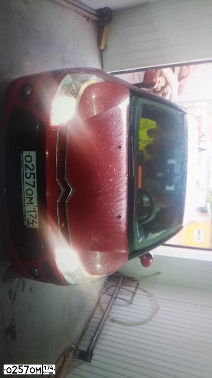 Фото автомобиля CITROEN C4, 2008 — госномер О257ОМ174. Цвет: Красный