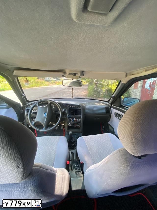 Фото автомобиля LADA 2112, 2007 — госномер У779КМ71. Цвет: ЧЕРНЫЙ