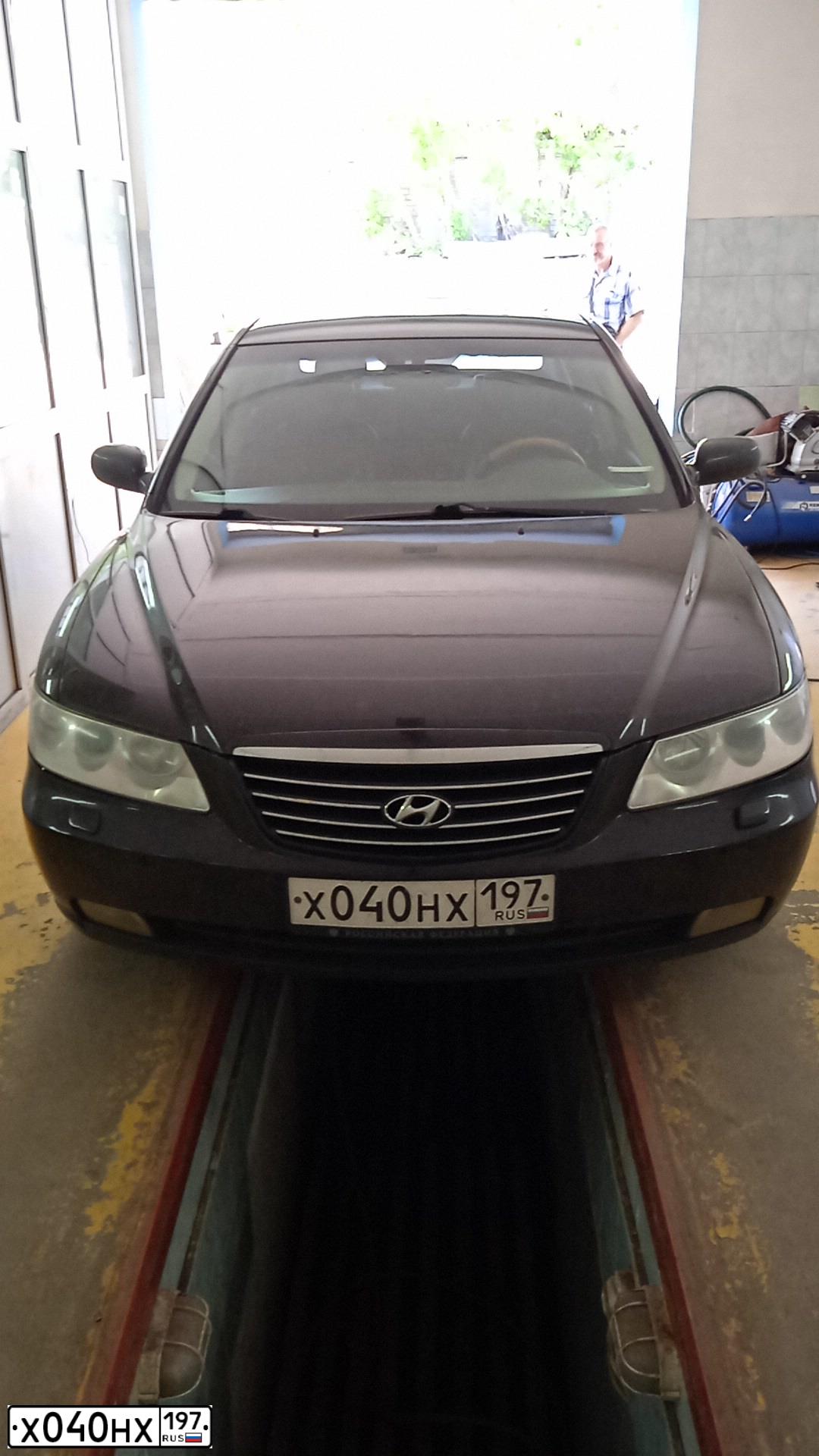 Фото автомобиля HYUNDAI GRANDEUR, 2006 — госномер В067МО50. Цвет: ФИОЛЕТОВЫЙ