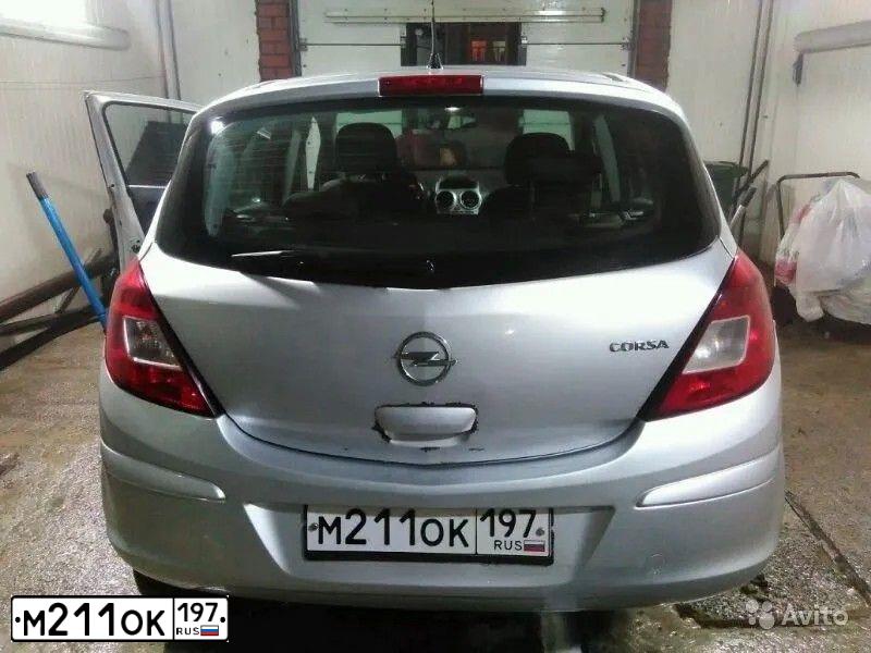 Фото автомобиля OPEL CORSA, 2011 — госномер Х900НЕ790. Цвет: Серебристый