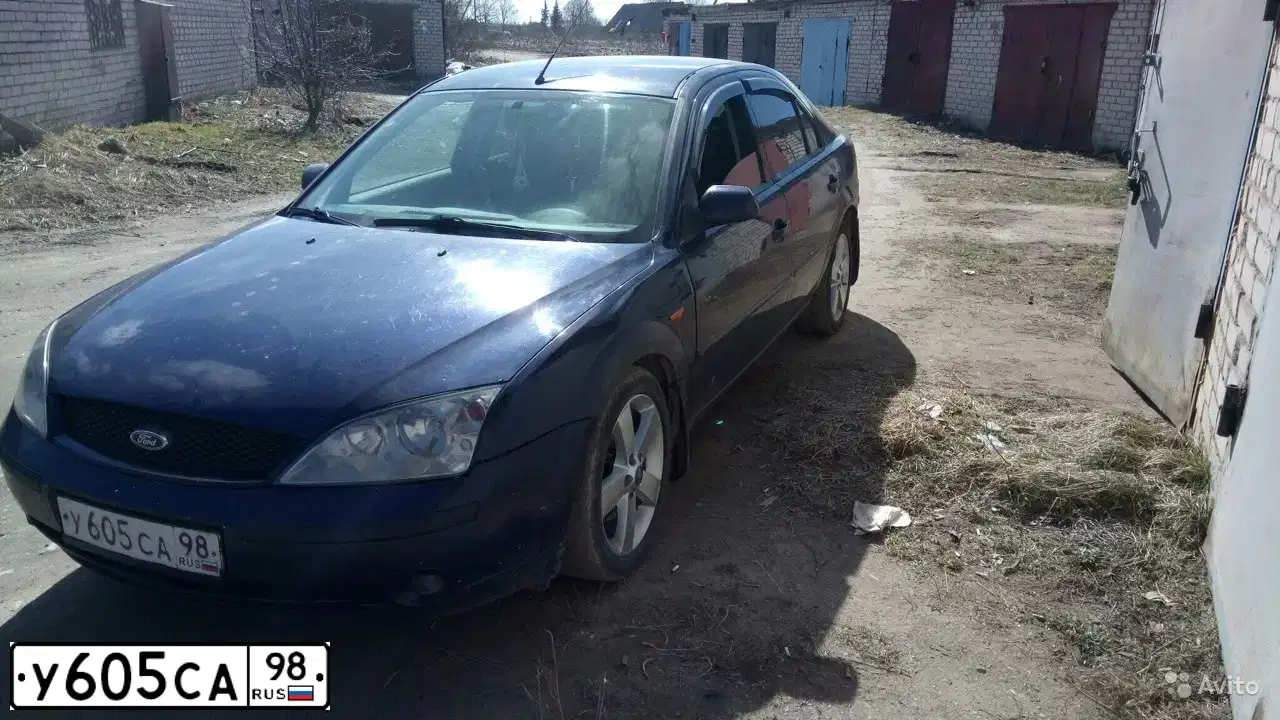 Фото автомобиля FORD MONDEO, 2000 — госномер М310УО60. Цвет: синий