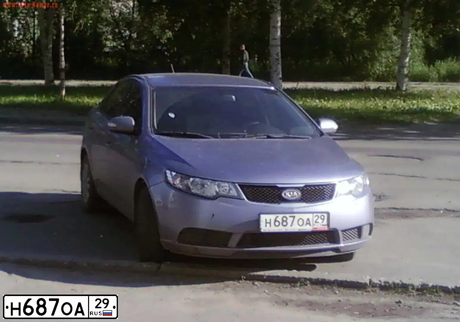 Фото автомобиля KIA CERATO, 2009 — госномер М232ОТ29. Цвет: СВЕТЛО-СЕРЫЙ