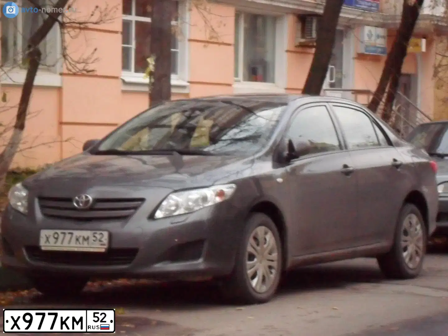 Фото автомобиля TOYOTA COROLLA, 2008 — госномер Х977КМ52. Цвет: СЕРЫЙ