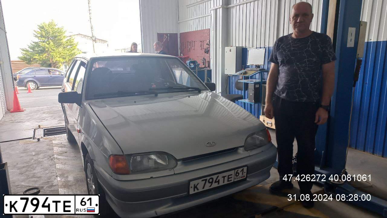Фото автомобиля LADA 2114 SAMARA, 2005 — госномер К794ТЕ61. Цвет: СЕРЕБРИСТО-ЖЕЛТО-ГОЛУБОЙ