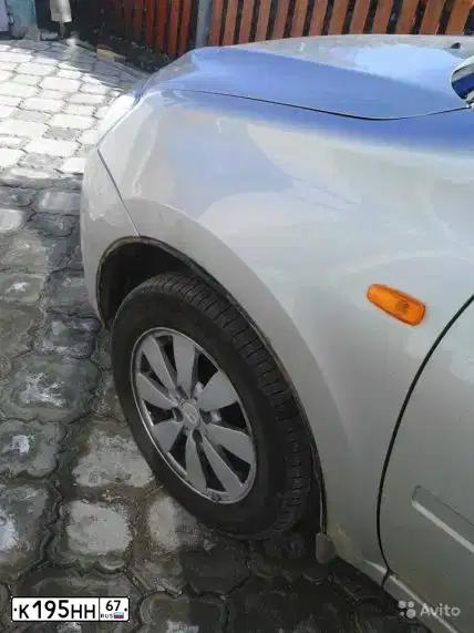 Фото автомобиля LADA 2190 GRANTA, 2013 — госномер К195НН67. Цвет: Серебристый