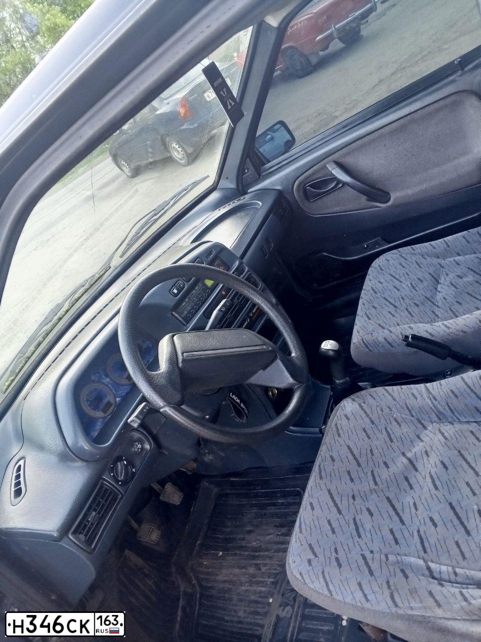 Фото автомобиля LADA 2114 SAMARA, 2010 — госномер Н346СК163. Цвет: Сине-Черный