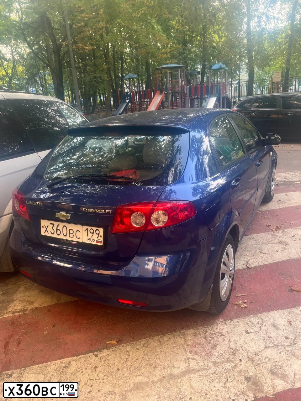 Фото автомобиля CHEVROLET LACETTI, 2007 — госномер К792КС76. Цвет: синий