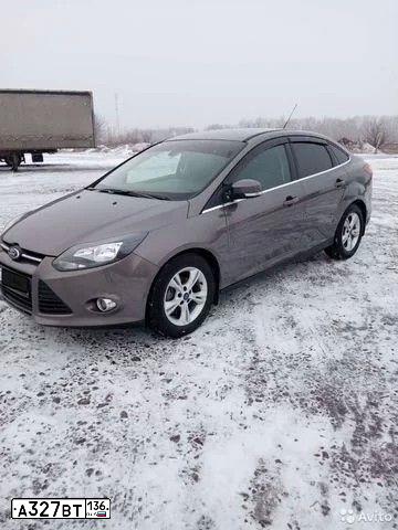 Фото автомобиля FORD FOCUS, 2011 — госномер Н953НК136. Цвет: СЕРО-КОРИЧНЕВЫЙ