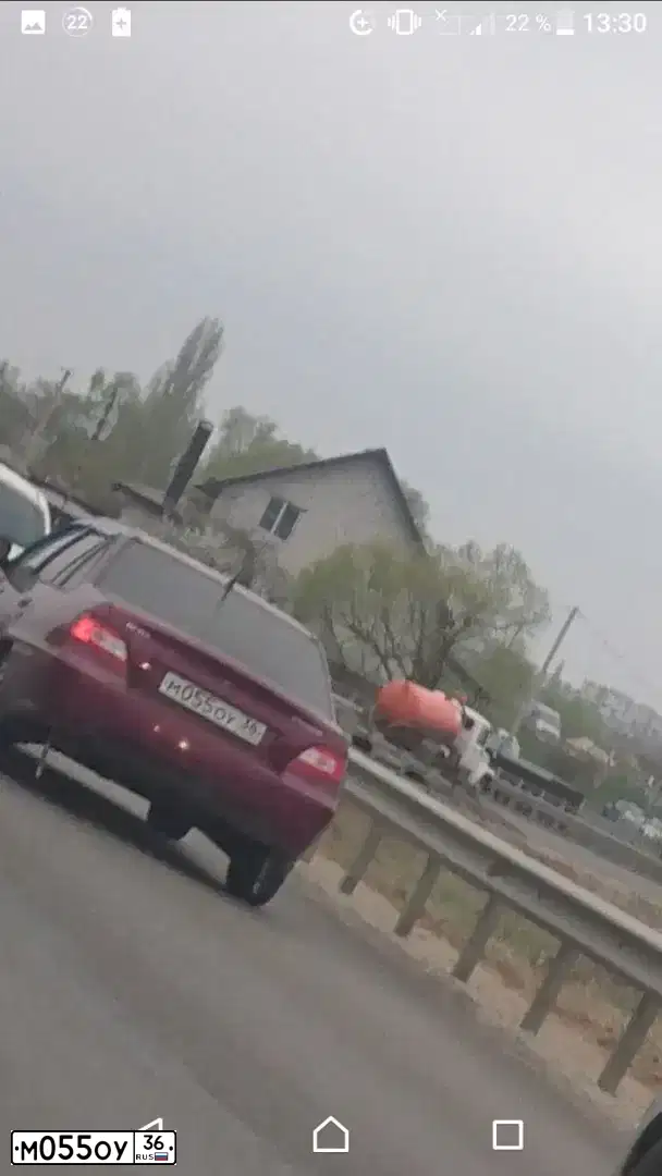Фото автомобиля DAEWOO NEXIA, 2008 — госномер М055ОУ36. Цвет: СПЕЛАЯ ВИШНЯ