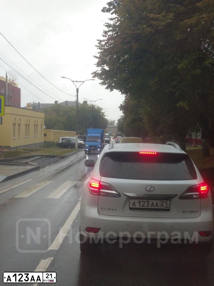 Фото автомобиля AUDI A6, 2010 — госномер А123АА21. Цвет: ЧЕРНЫЙ
