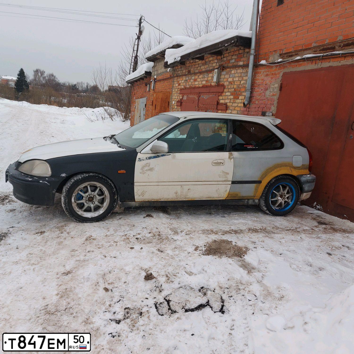 Фото автомобиля HONDA CIVIC, 1998 — госномер Т847ЕМ50. Цвет: БЕЛО-СЕРЫЙ