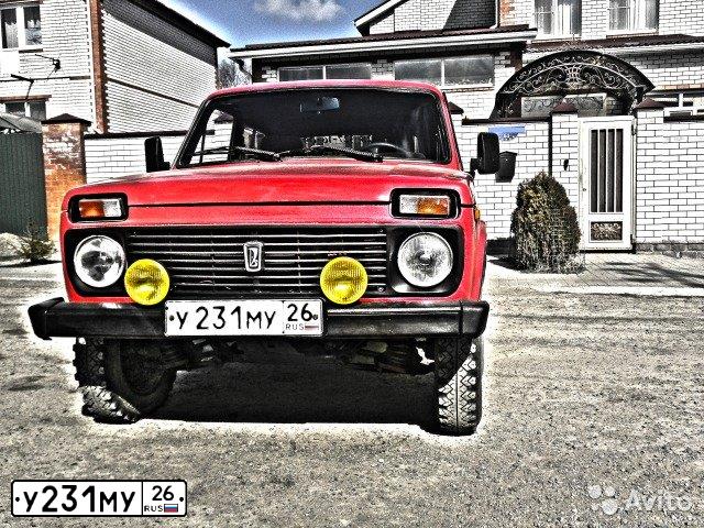 Фото автомобиля LADA 2121 NIVA, 1986 — госномер Е474ЕС01. Цвет: КРАСНЫЙ