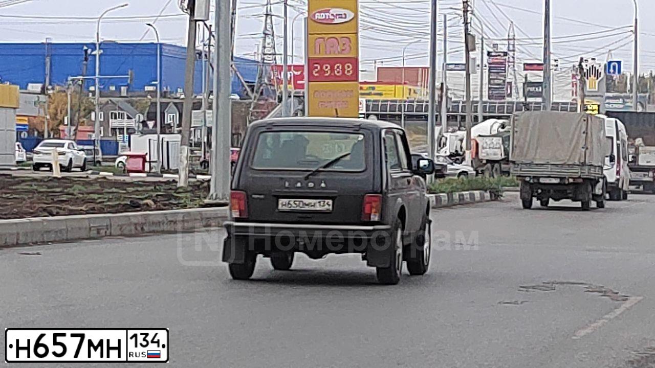 Фото автомобиля RENAULT LOGAN, 2017 — госномер Н657МН134. Цвет: БЕЖЕВЫЙ