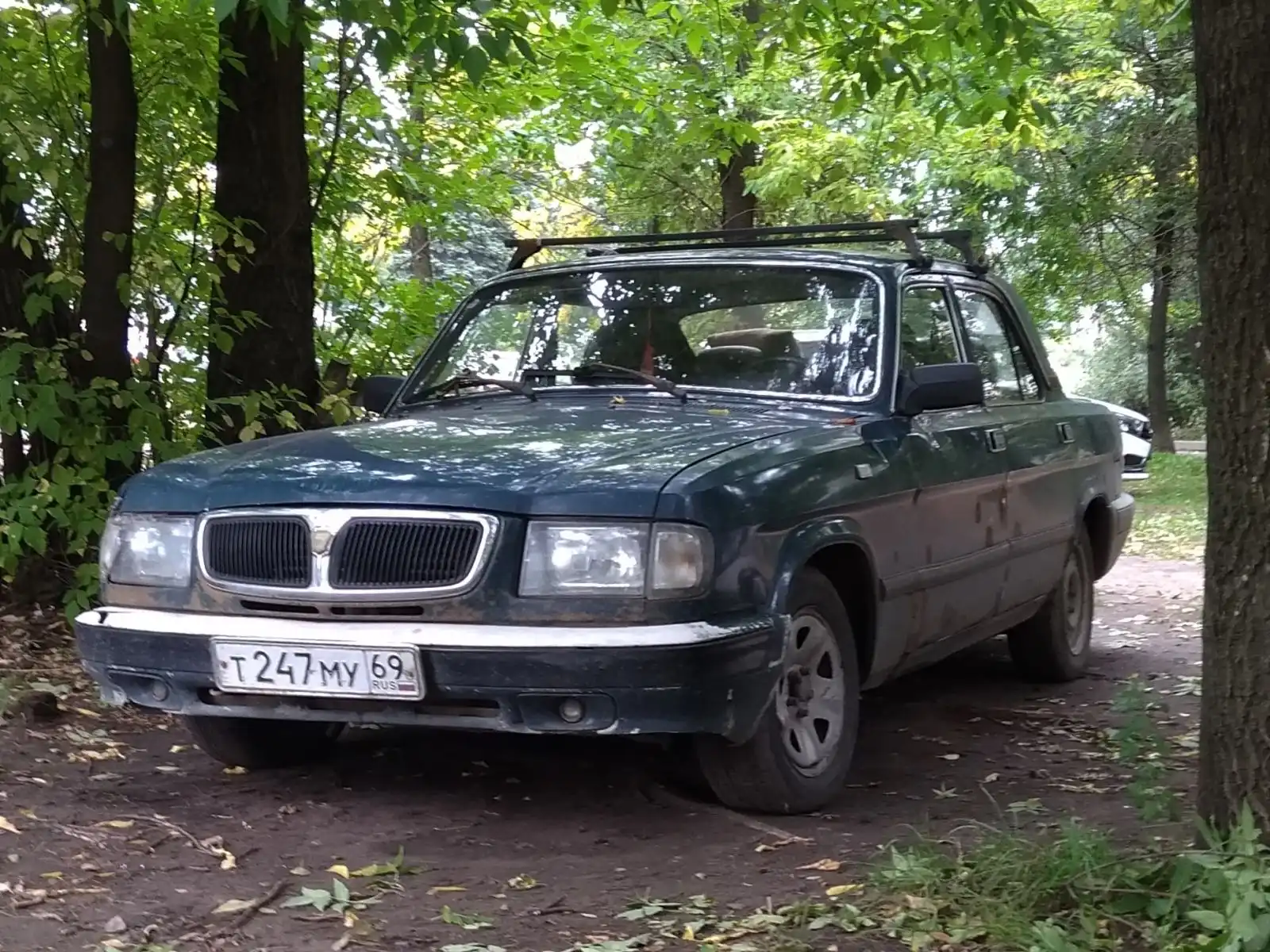 Фото автомобиля GAZ 3110 WOLGA, 2001 — госномер Т247МУ69. Цвет: СИНЕ ЗЕЛЕНЫЙ