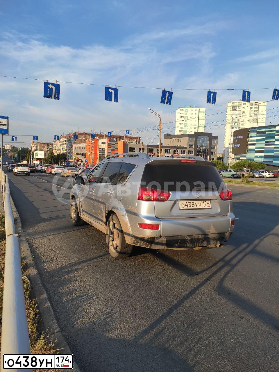 Фото автомобиля PEUGEOT 4007, 2009 — госномер Т285МА774. Цвет: Серебристый
