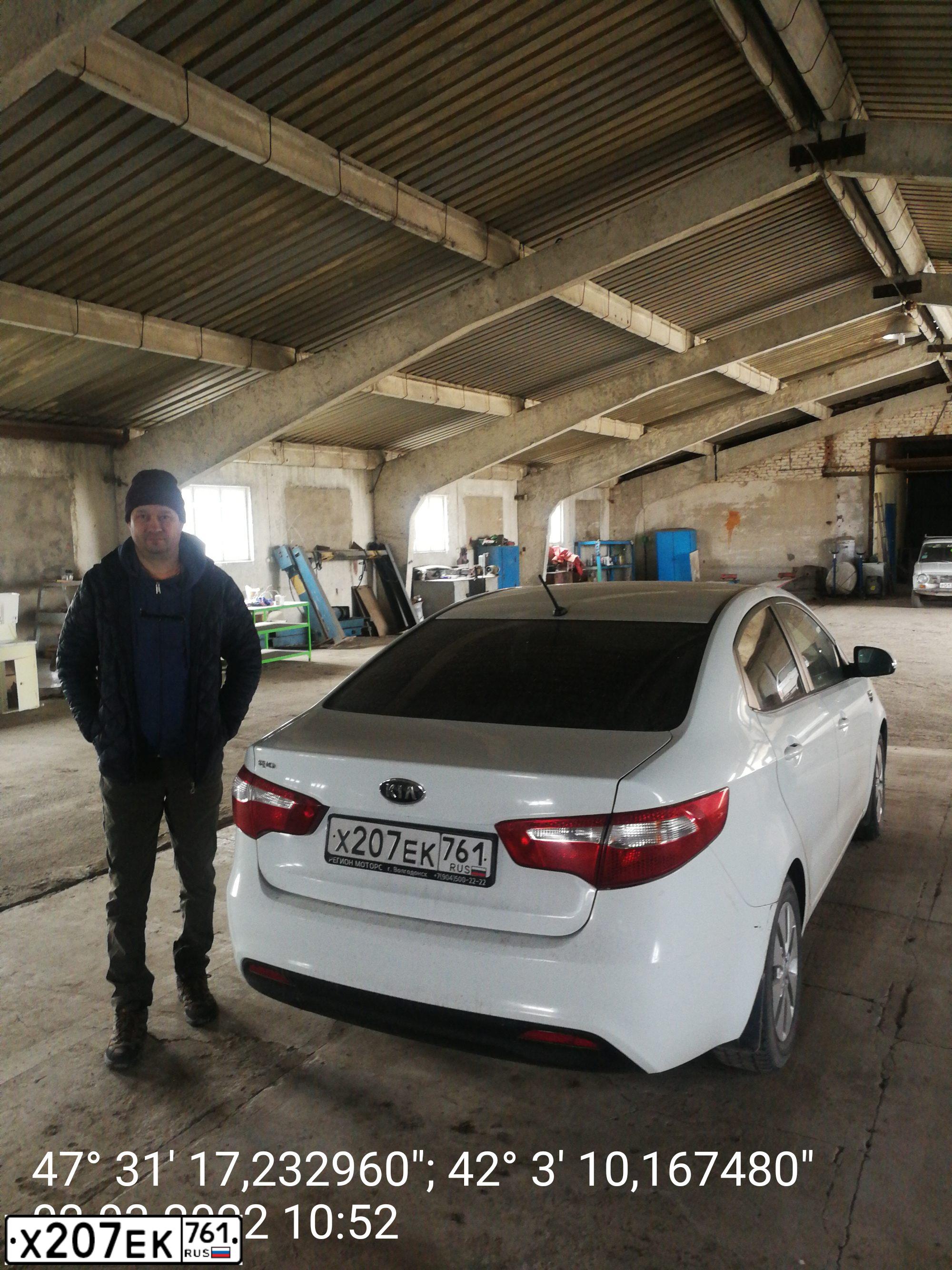 Фото автомобиля KIA RIO, 2011 — госномер Х207ЕК761. Цвет: Белый