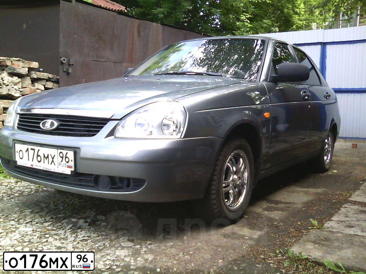 Фото автомобиля LADA 2172 PRIORA, 2009 — госномер Т199УР55. Цвет: СЕРО-ЗЕЛЕНЫЙ