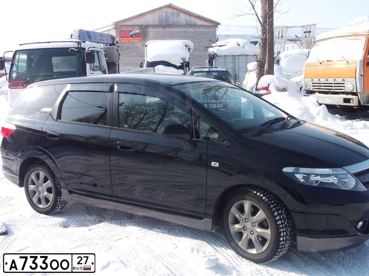 Фото автомобиля TOYOTA LANDCRUISER, 1999 — госномер А733ОО27. Цвет: Белый