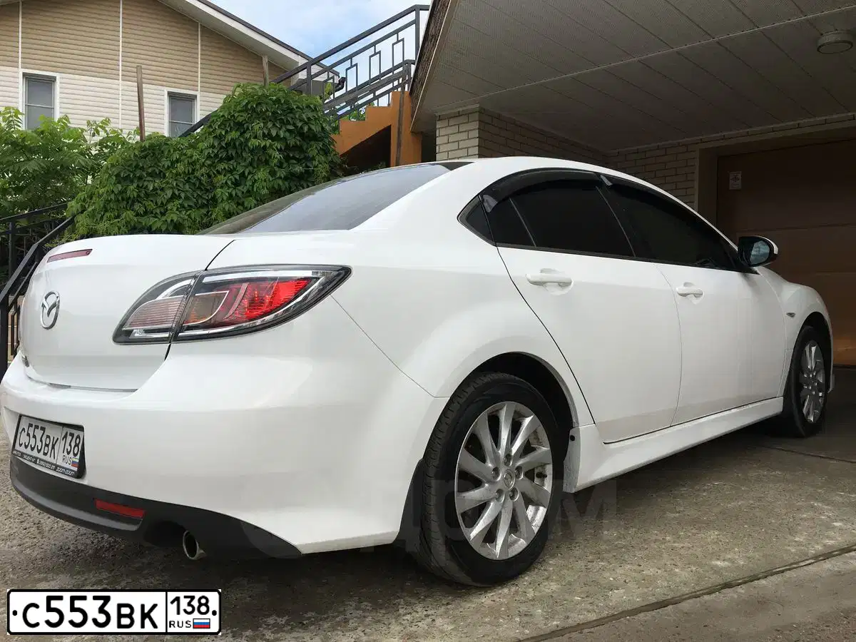Фото автомобиля MAZDA 6, 2011 — госномер К686ХК38. Цвет: Белый