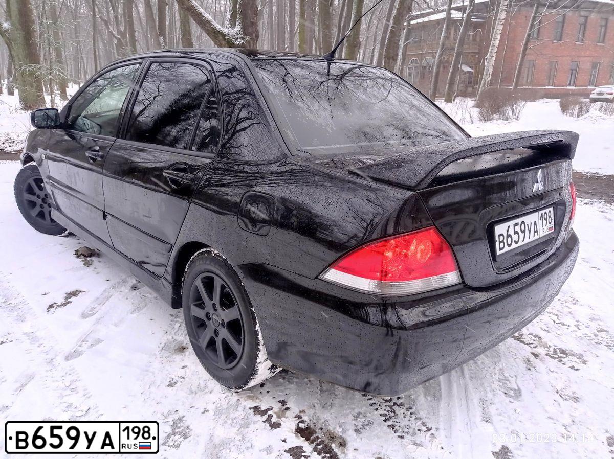 Фото автомобиля MITSUBISHI LANCER, 2007 — госномер А545МА60. Цвет: ЧЕРНЫЙ МЕТАЛЛИК