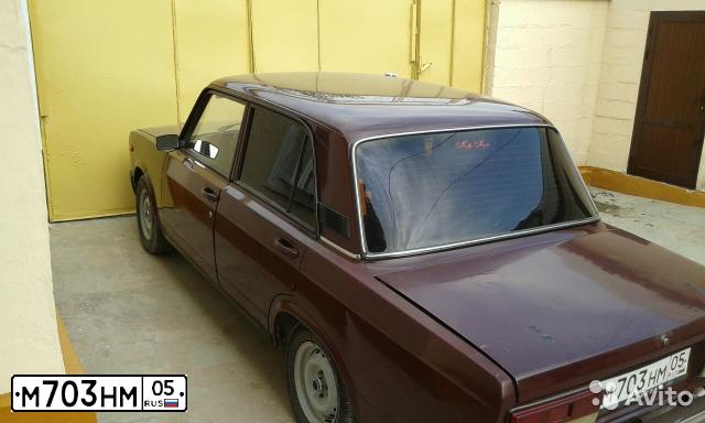 Фото автомобиля LADA 2107, 2002 — госномер М703НМ05. Цвет: ТЕМНО-БОРДОВЫЙ