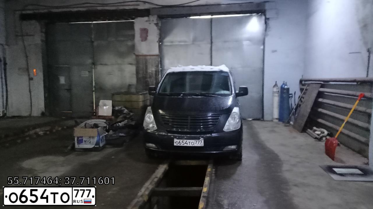 Фото автомобиля HYUNDAI GRAND STAREX, 2010 — госномер А936ВА134. Цвет: ЧЕРНЫЙ
