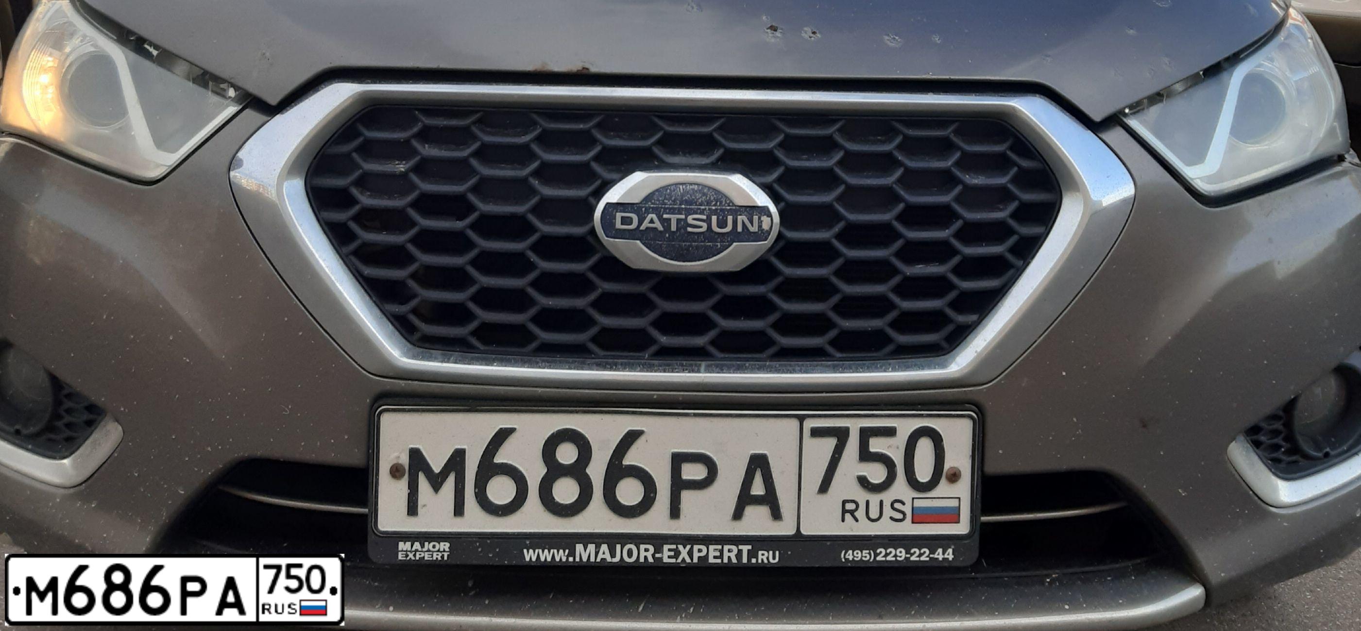 Фото автомобиля DATSUN MI-DO, 2015 — госномер М686РА790. Цвет: Серый