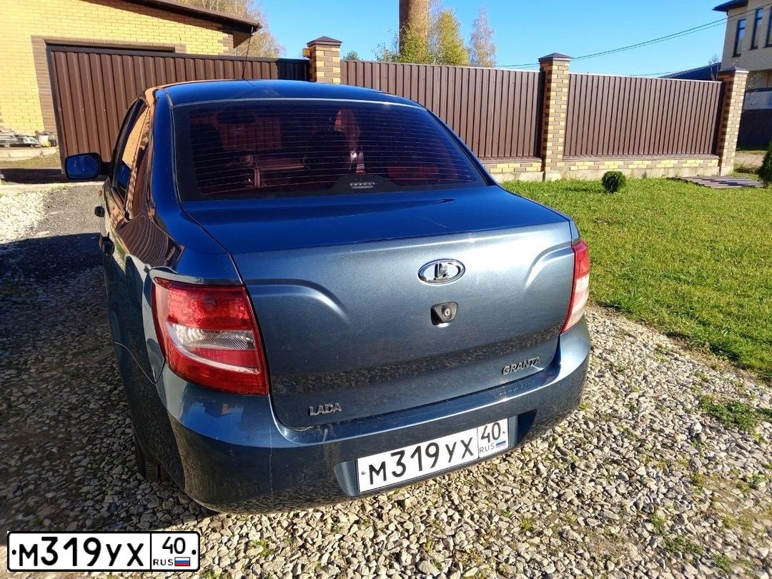 Фото автомобиля LADA 2190 GRANTA, 2014 — госномер М319УХ40. Цвет: СЕРО-СИНИЙ