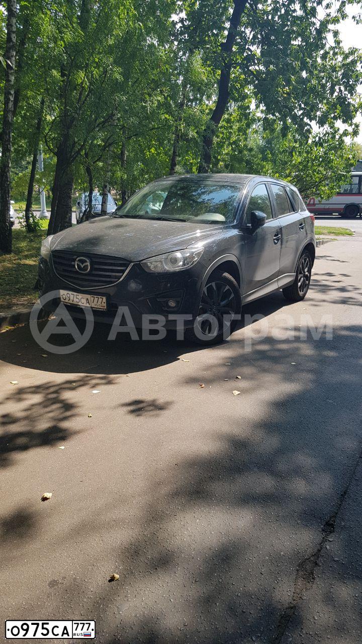 Фото автомобиля MAZDA CX-5, 2016 — госномер О975СА777. Цвет: ЧЕРНЫЙ