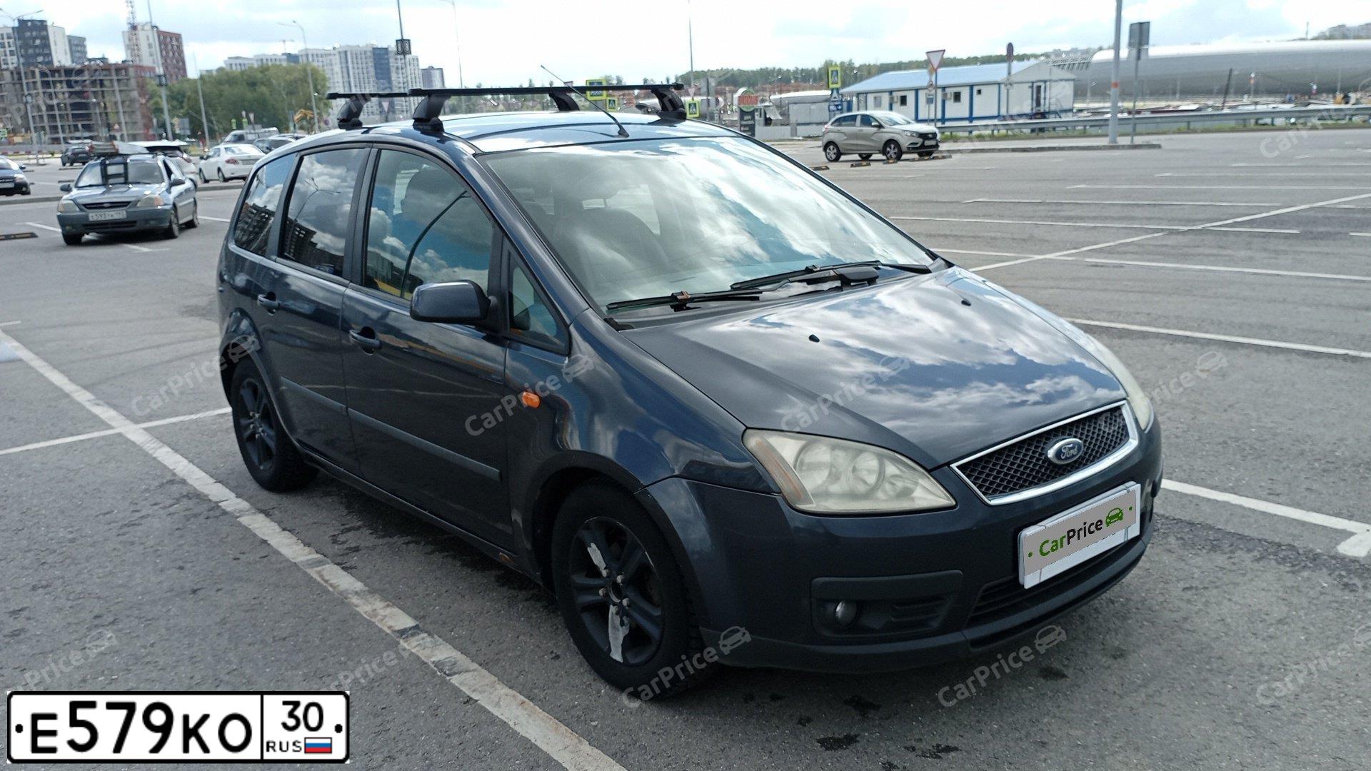 Фото автомобиля FORD FOCUS C-MAX, 2005 — госномер Е579КО30. Цвет: ТЕМНО-СЕРЫЙ