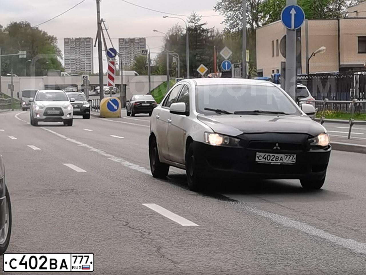 Фото автомобиля MITSUBISHI LANCER, 2008 — госномер С402ВА777. Цвет: БЕЛЫЙ