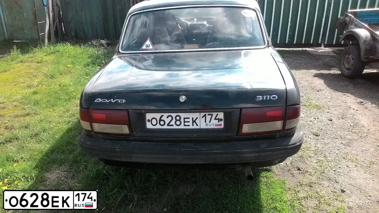 Фото автомобиля GAZ 3110 WOLGA, 1998 — госномер О628ЕК174. Цвет: ЧЕРНЫЙ