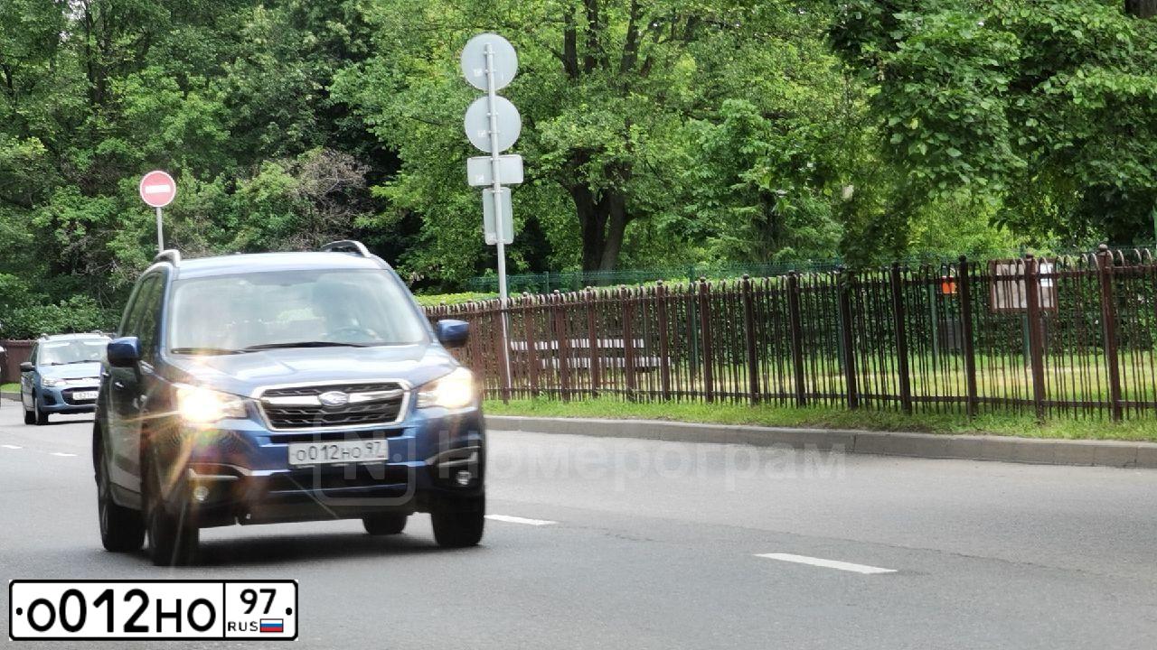 Фото автомобиля SUBARU FORESTER, 2011 — госномер Х966ОА77. Цвет: СИНИЙ