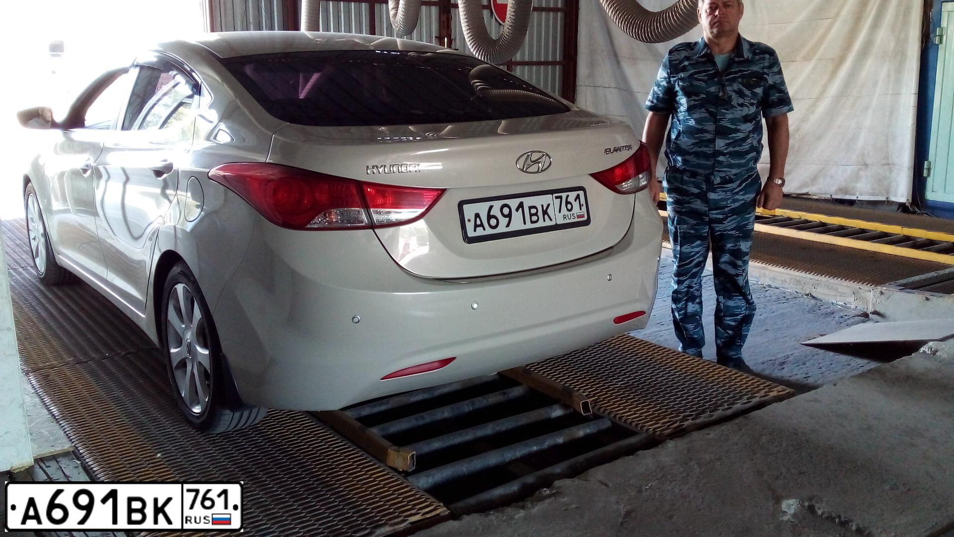Фото автомобиля HYUNDAI ELANTRA, 2012 — госномер Н404ТС93. Цвет: СЕРЫЙ
