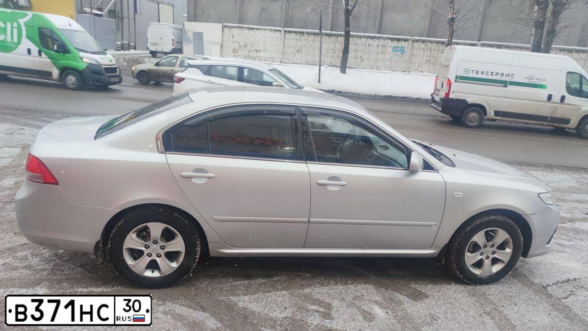 Фото автомобиля KIA MAGENTIS / OPTIMA, 2009 — госномер Т558МЕ977. Цвет: СЕРЫЙ