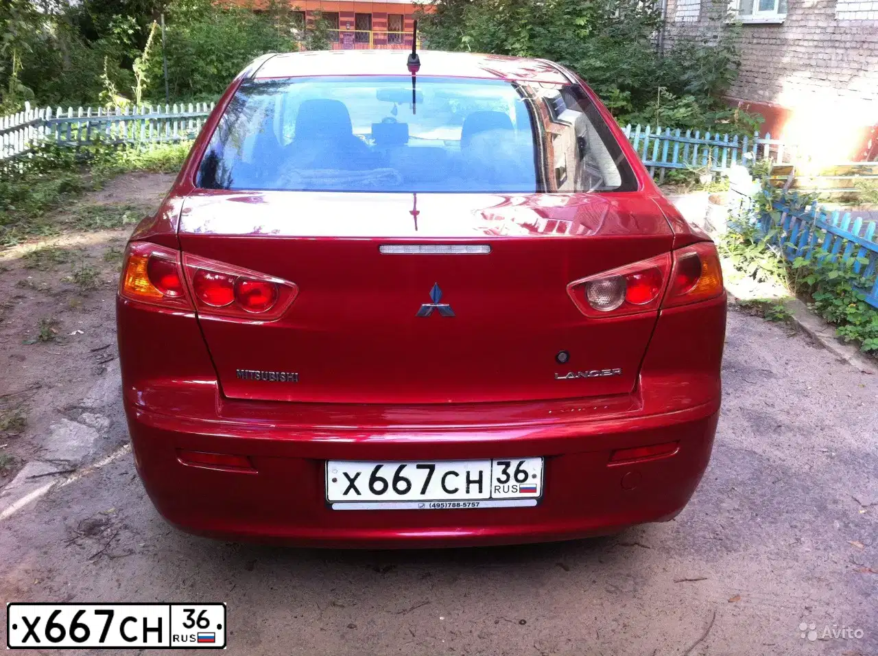 Фото автомобиля MITSUBISHI LANCER, 2008 — госномер С947НМ136. Цвет: Красный