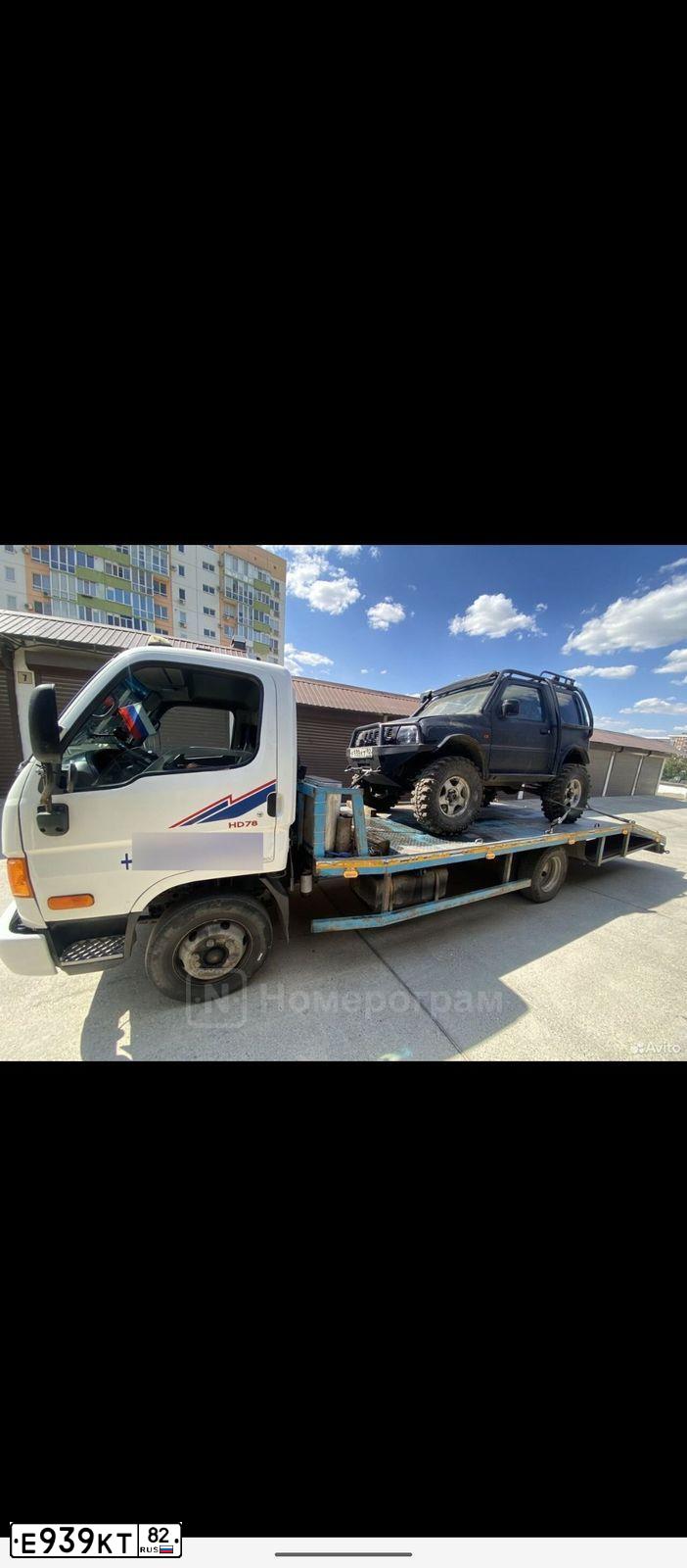 Фото автомобиля SUZUKI JIMNY, 2007 — госномер Е939КТ82. Цвет: ЧЕРНЫЙ