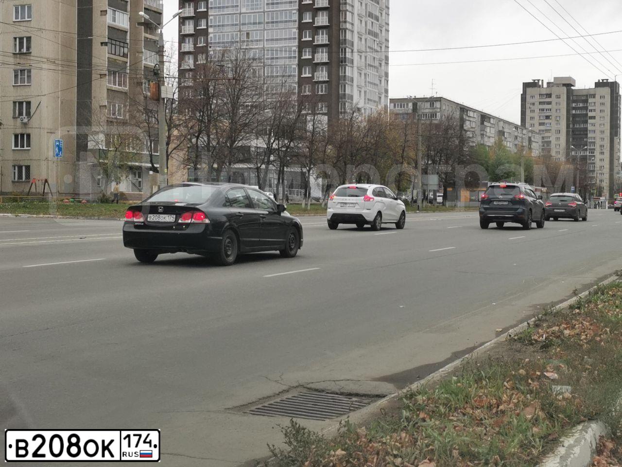 Фото автомобиля HONDA CIVIC, 2011 — госномер В208ОК174. Цвет: ЧЕРНЫЙ
