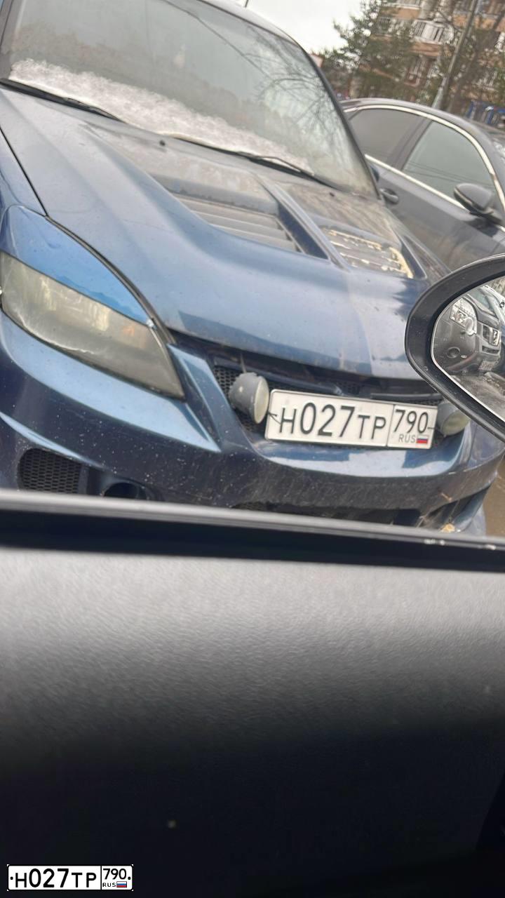 Фото автомобиля MITSUBISHI LANCER, 2006 — госномер Н027ТР790. Цвет: синий
